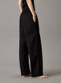Calvin Klein CK ESTABLISHED Womens Pyjama Pants Black side view showcasing relaxed fit and pockets.