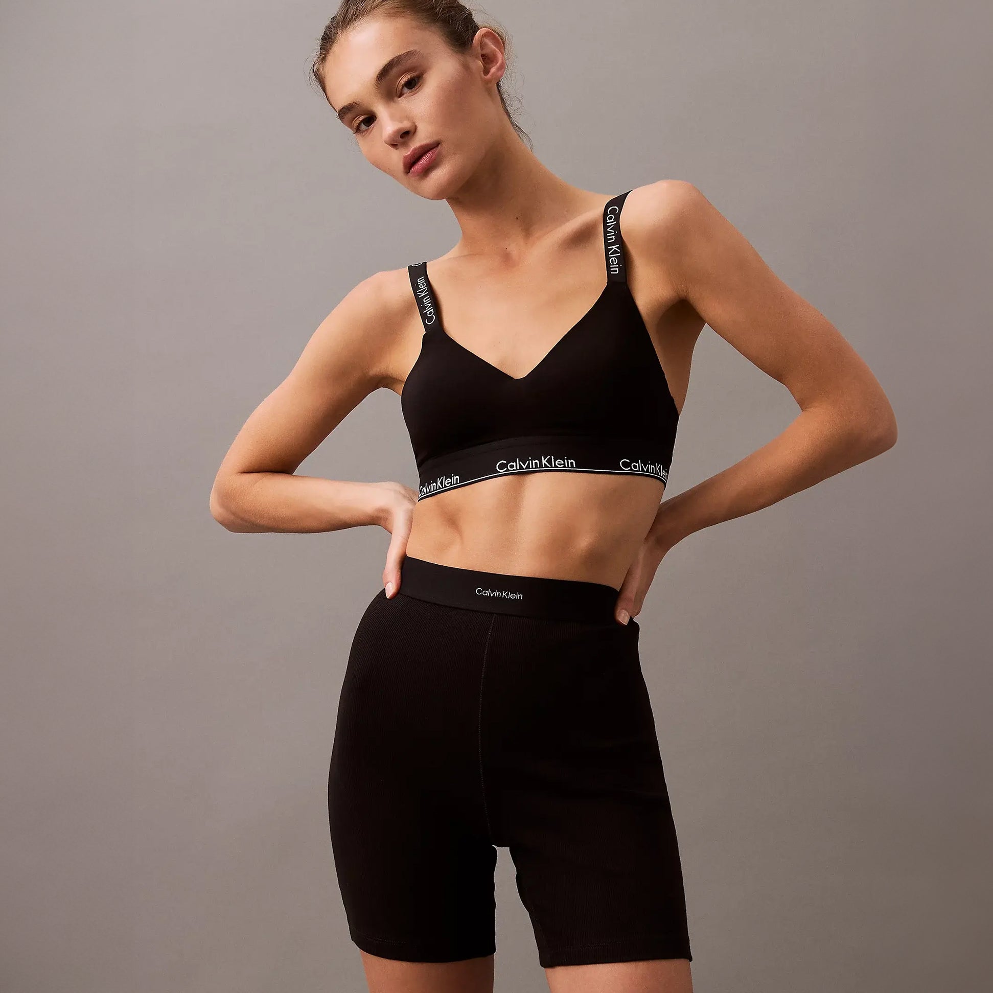 Calvin Klein COTTON STRETCH RIB Womens Lounge Shorts Black front view, model wearing matching black bralette.