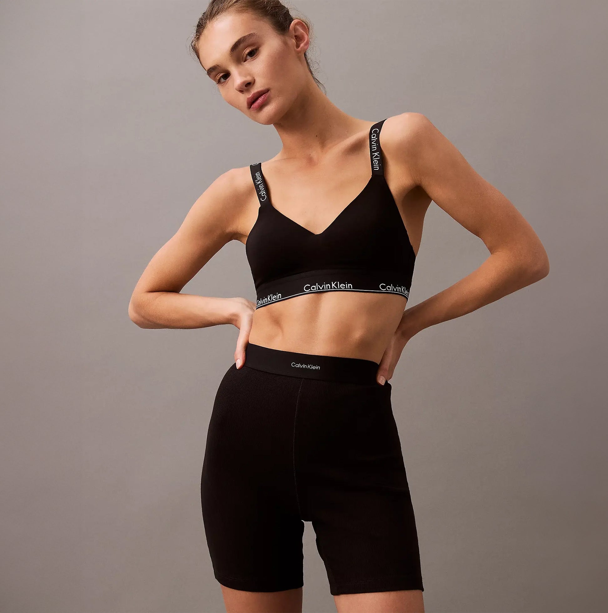 Calvin Klein COTTON STRETCH RIB Womens Lounge Shorts Black front view, model wearing matching black bralette.