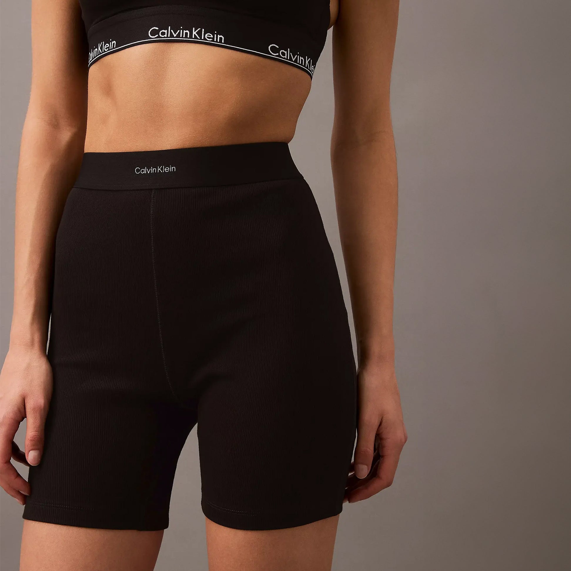 Calvin Klein COTTON STRETCH RIB Womens Lounge Shorts Black front view showcasing slim fit and elastic waistband.