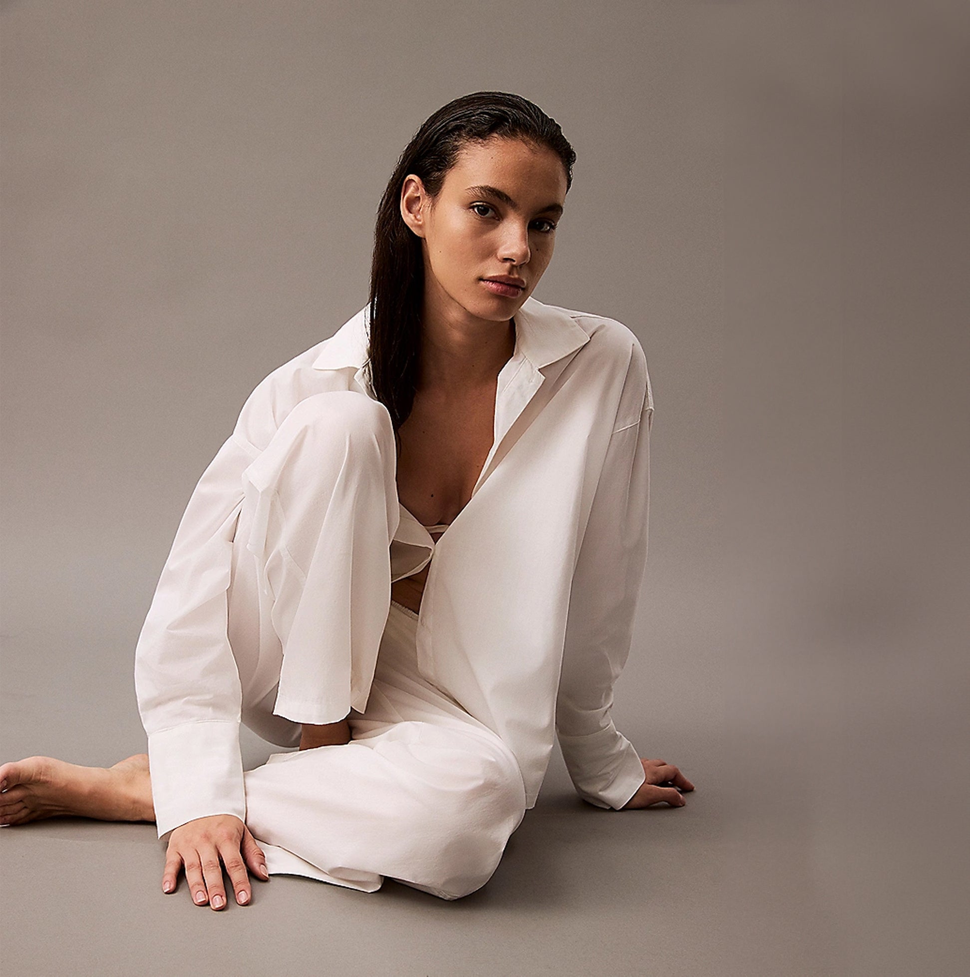 Calvin Klein COTTON POPLIN Womens Pyjama Pants White front view featuring a model in a relaxed pose.