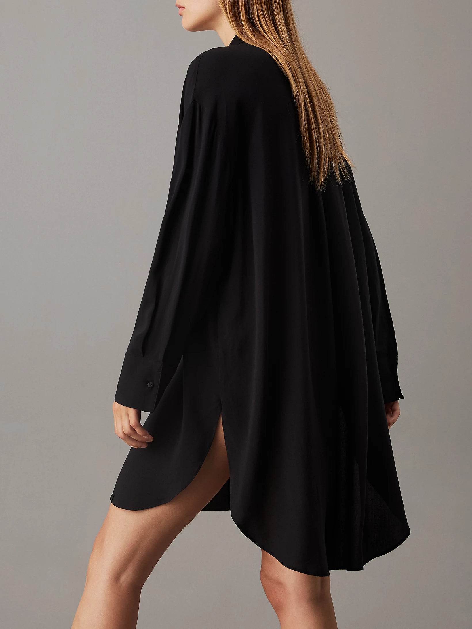 Calvin Klein WOVEN VISCOSE Womens Nightshirt Black side view showcasing the long sleeve and relaxed fit.