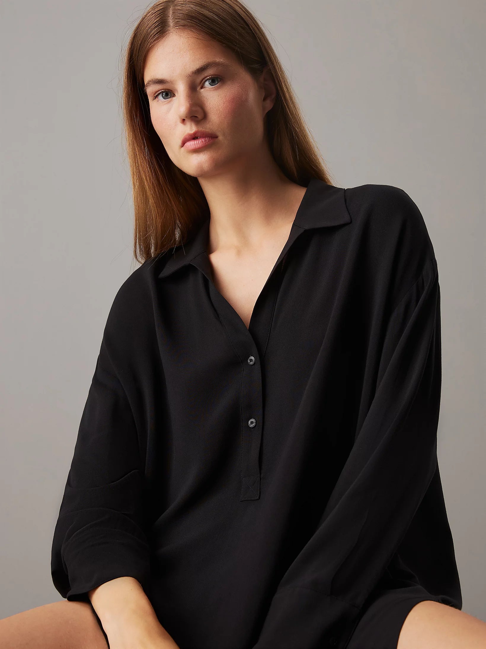 Calvin Klein WOVEN VISCOSE Womens Nightshirt Black front view on model, showcasing relaxed fit and long sleeves.