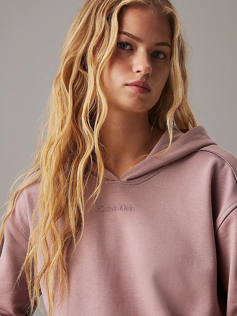 Calvin Klein TONAL LOGO LOUNGE Womens Hoodie Sand Trap front view with model, showing soft fabric and hood design.