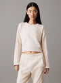 Calvin Klein COTTON FLEECE Womens Crew Pullover Sandshell front view worn by model with matching pants.