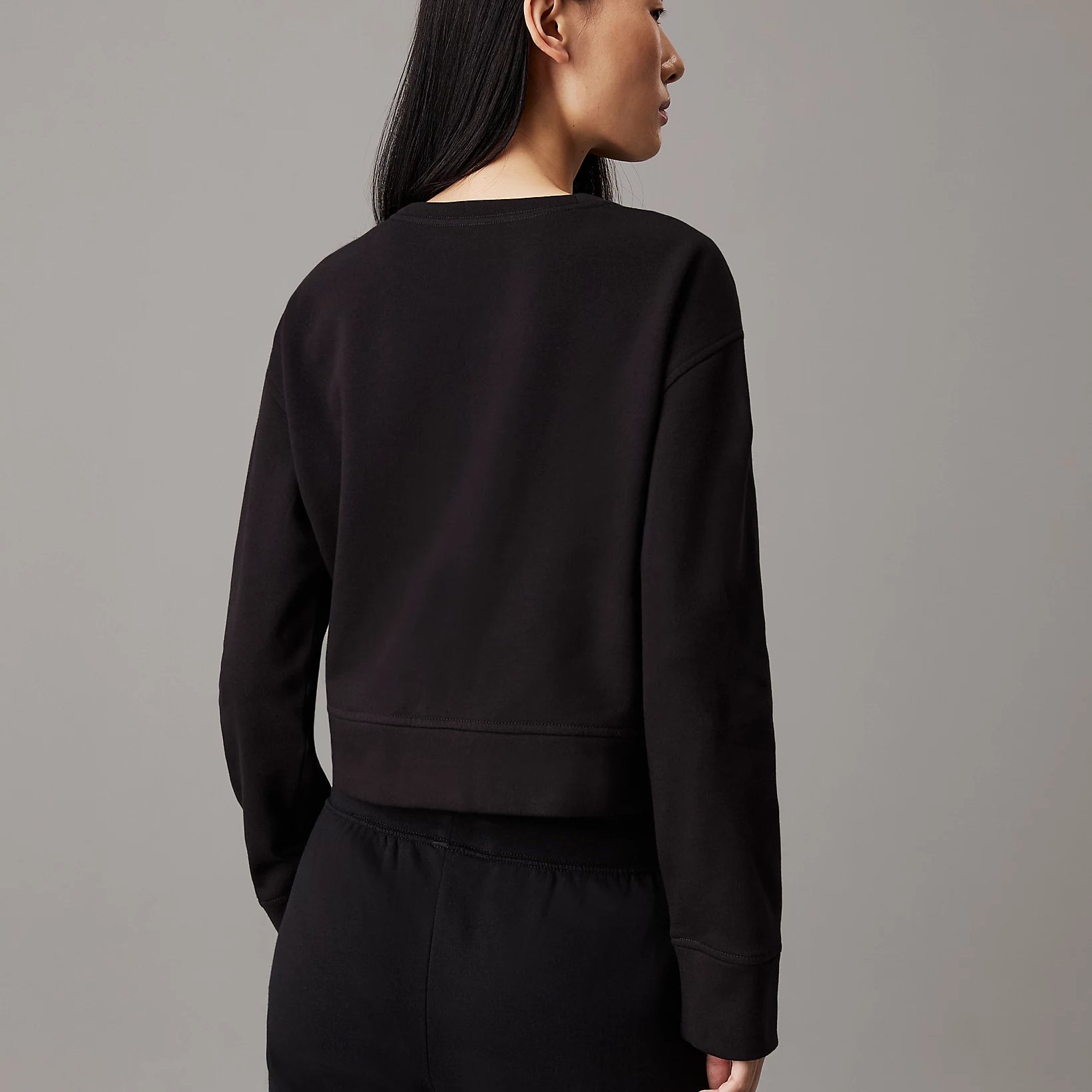 Calvin Klein COTTON FLEECE Womens Crew Pullover Black back view showcasing the stylish design and comfortable fit.