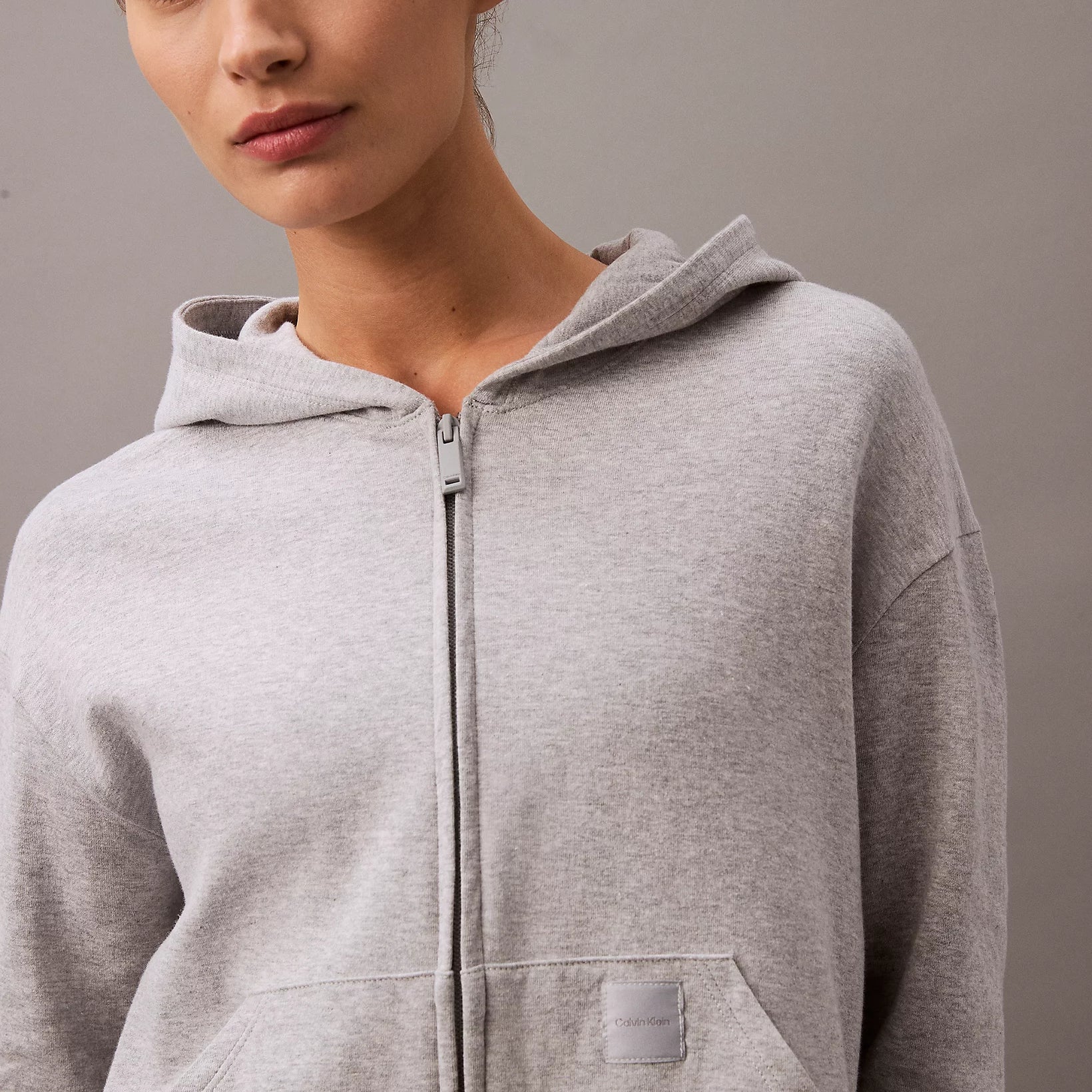 Calvin Klein MODERN TERRY Womens Full Zip Hoodie Grey Heather front view, showcasing soft fabric and zip detail.