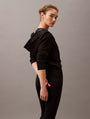 Calvin Klein MODERN TERRY Womens Full Zip Hoodie Black side view, showcasing the stylish hood and casual fit.
