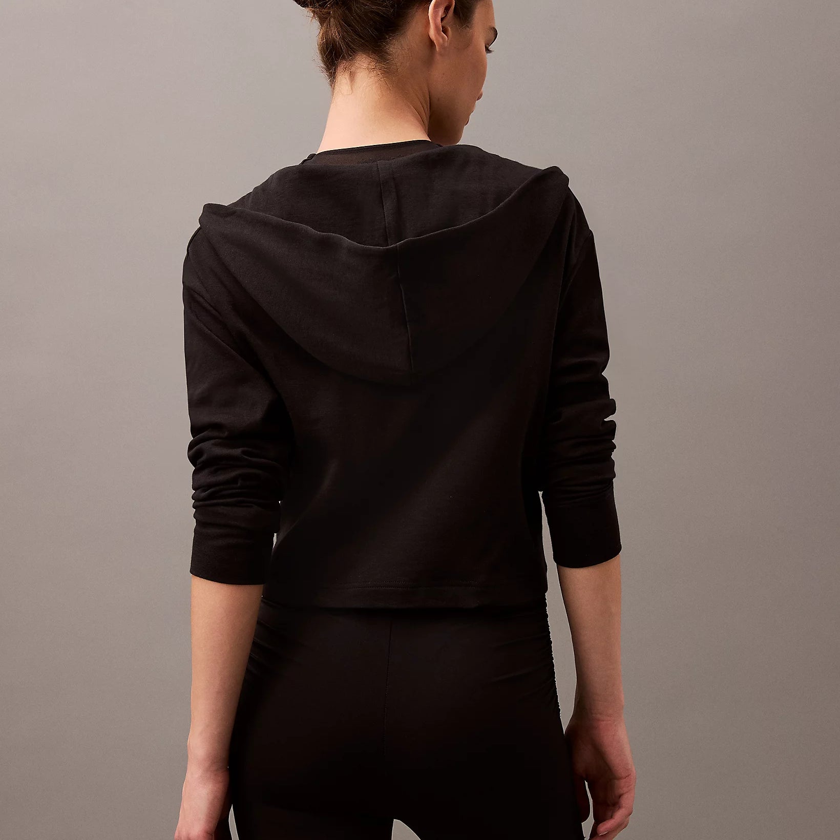 Calvin Klein MODERN TERRY Womens Full Zip Hoodie Black back view, showcasing the stylish hood and fitted design.