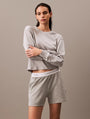 Calvin Klein MODERN TERRY Womens Sweatshirt Grey Heather front view on model, showcasing comfort and style.