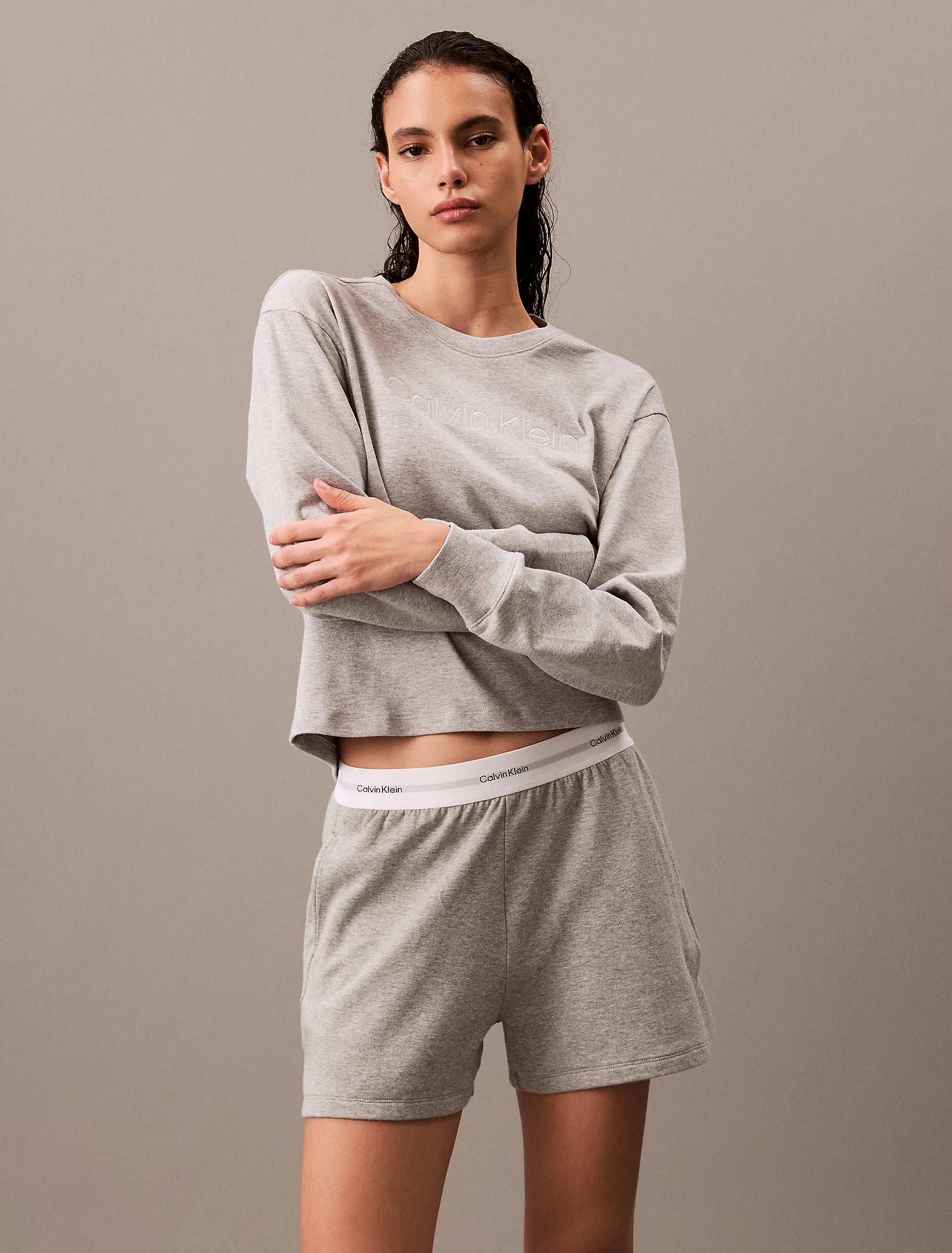 Calvin Klein MODERN TERRY Womens Sweatshirt Grey Heather front view on model, showcasing comfort and style.