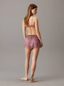 Calvin Klein CK INSTINCT SLEEP Womens Shorts Vintage Pink back view of model wearing shorts.