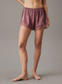 Calvin Klein CK INSTINCT SLEEP Womens Shorts Vintage Pink front view showcasing soft fabric and lace detailing.