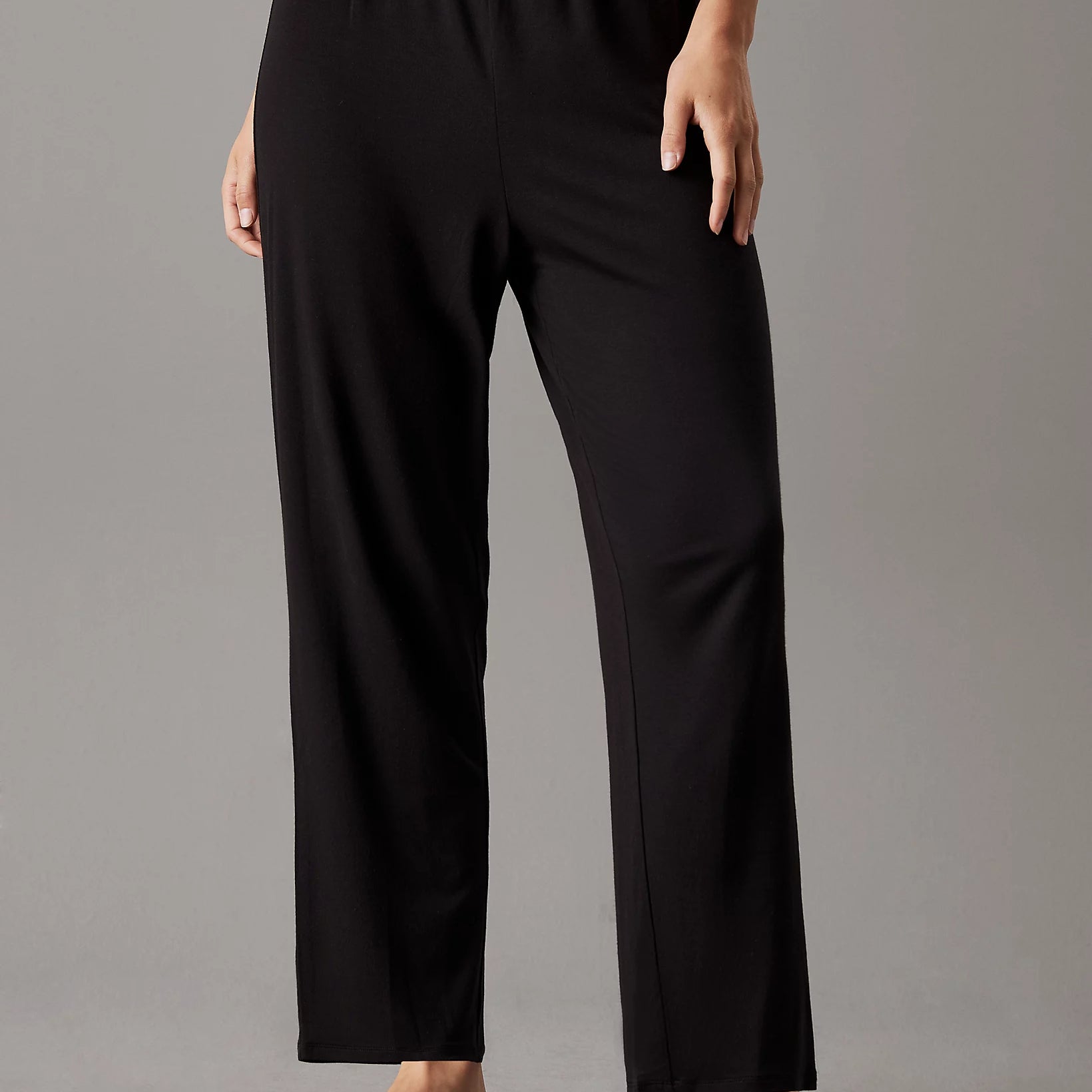 Calvin Klein CK ATTRACTION Womens Pyjama Pants Black side view showcasing comfort fit and soft material.