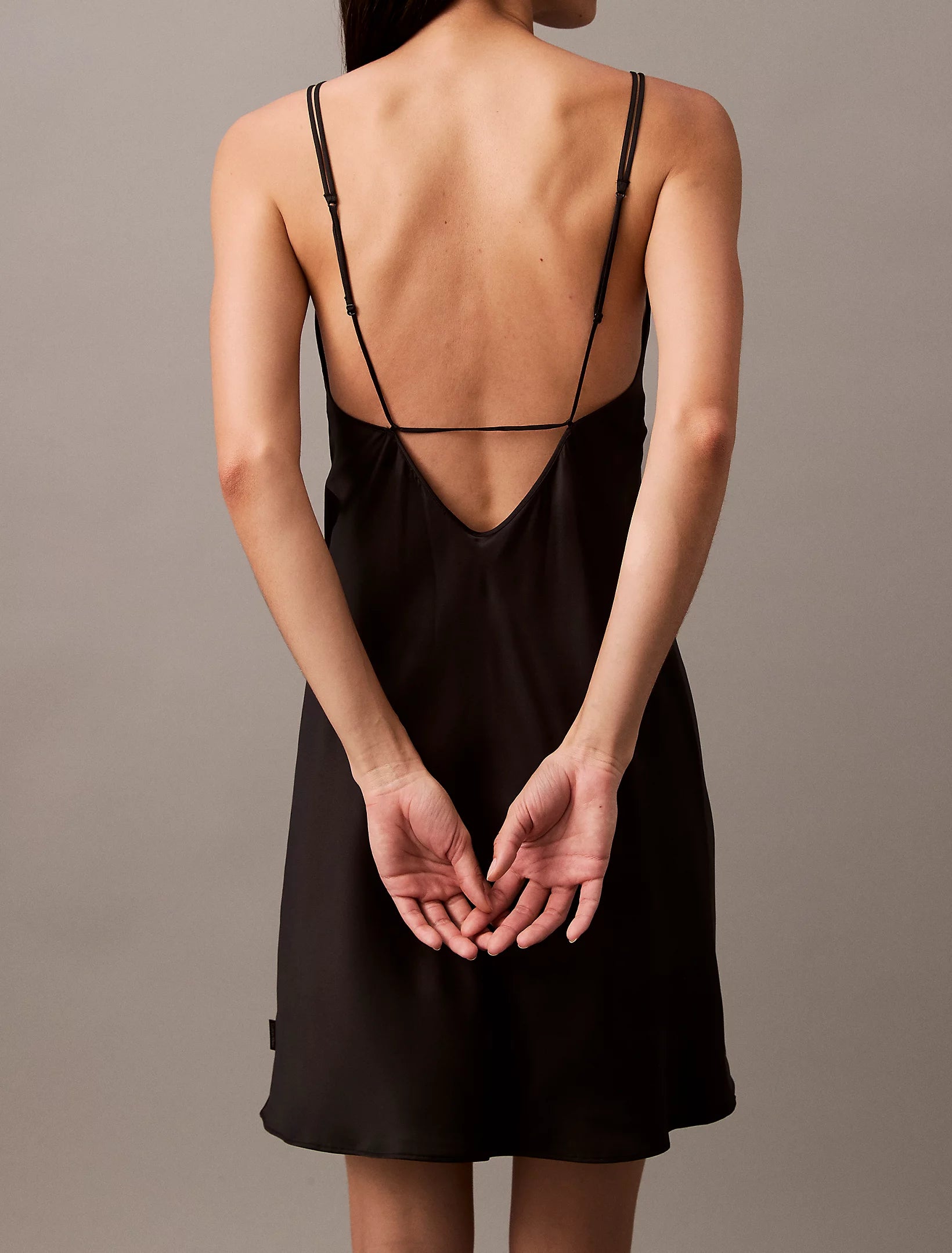 Calvin Klein CK INSTINCT Satin Night Dress Chemise Black back view showcasing low-cut back and thin straps.