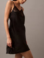 Calvin Klein CK INSTINCT Satin Night Dress Chemise Black side view showcasing flared hem and scalloped lace neckline.