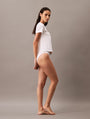 Calvin Klein COTTON TEES Womens T Shirt White side view on model, showcasing comfort and style in 100% cotton.