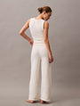 Calvin Klein PLUSH SWEATER Womens Pants Ivory back view showcasing relaxed fit and comfort material.