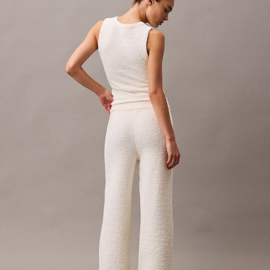 Calvin Klein PLUSH SWEATER Womens Pants Ivory back view showcasing relaxed fit and comfort material.