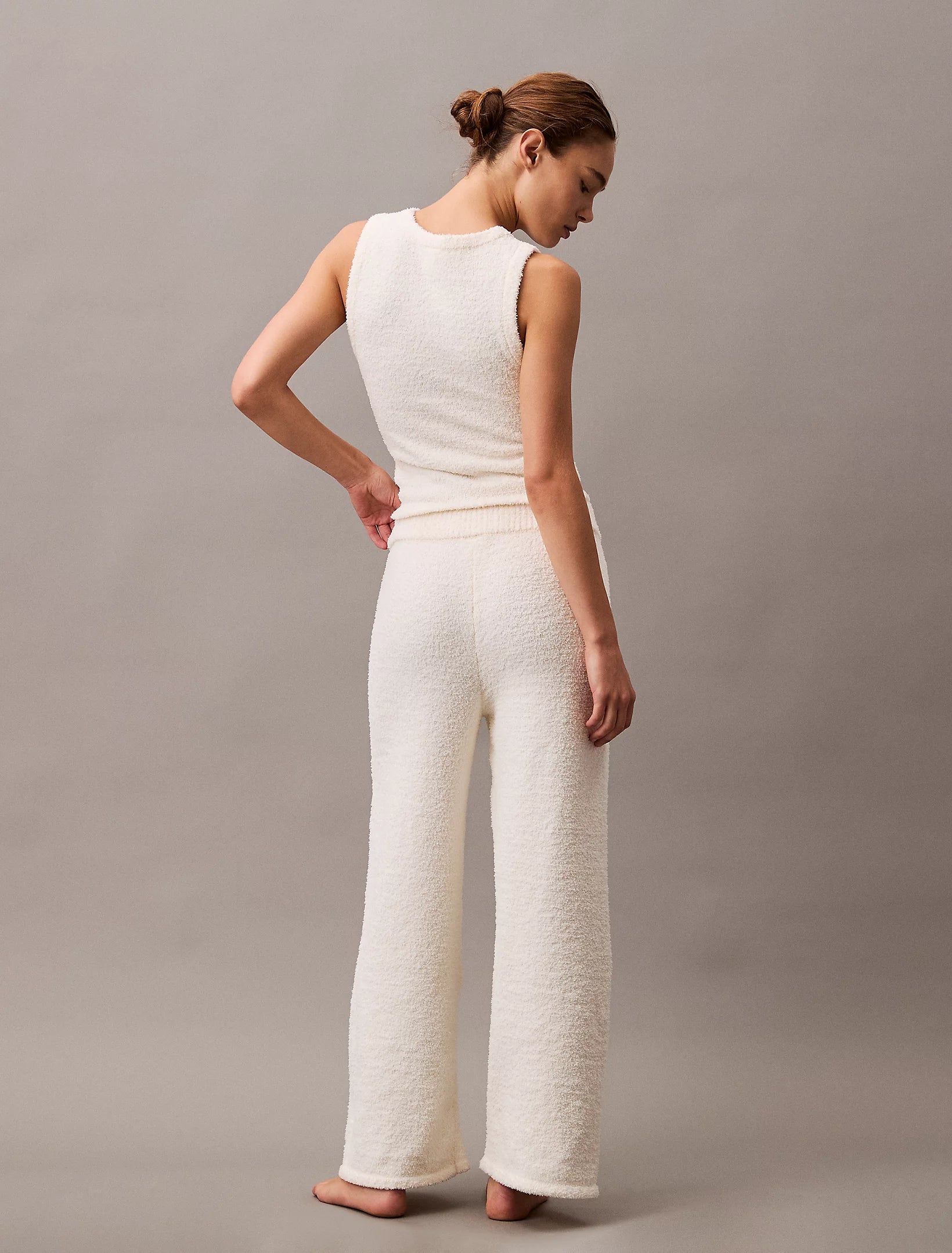 Calvin Klein PLUSH SWEATER Womens Pants Ivory back view showcasing relaxed fit and comfort material.