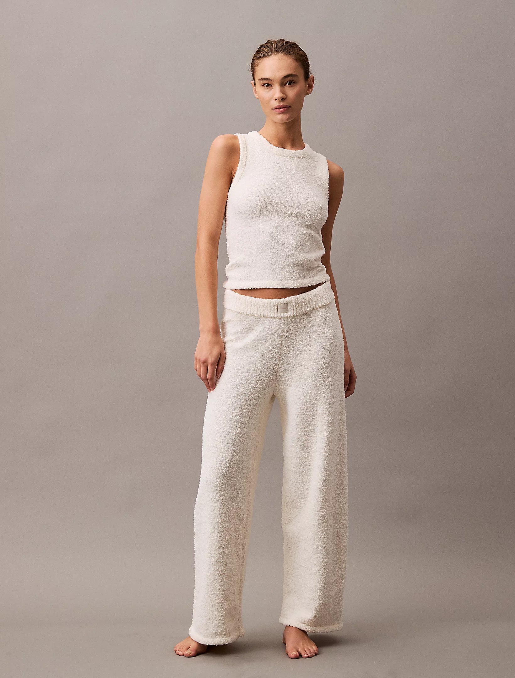 Calvin Klein PLUSH SWEATER Womens Pants Ivory front view showcasing soft, relaxed fit loungewear in ivory color.