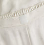 Calvin Klein WOVEN VISCOSE Womens Button Down Pants Set Diamond Logo/Cocoon close-up of waistband detail.