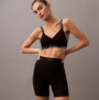 Calvin Klein COTTON STRETCH RIB Womens Lounge Shorts Black front view model wearing shorts and matching bralette.