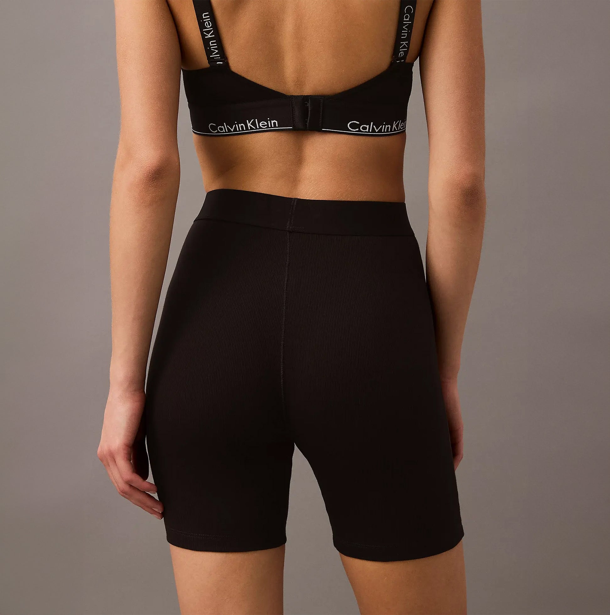 Calvin Klein COTTON STRETCH RIB Womens Lounge Shorts Black back view, featuring signature elastic waistband and slim fit.