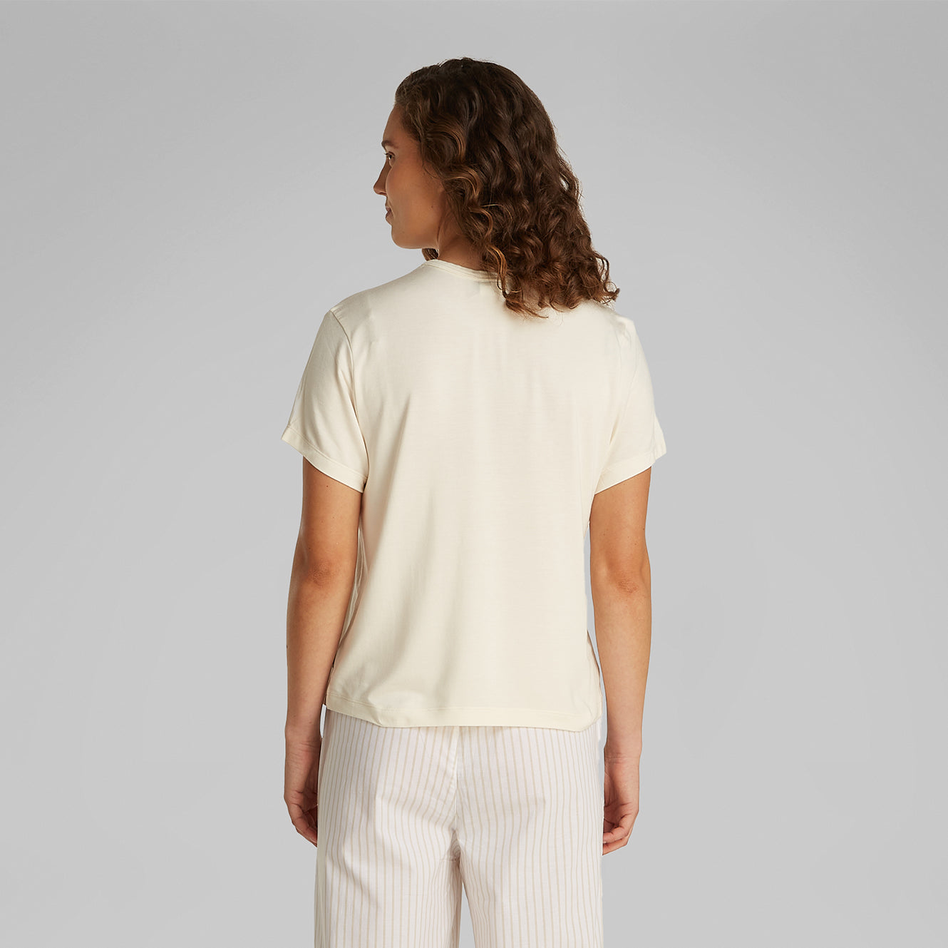 Calvin Klein ULTRA SOFT MODAL Womens Lounge T-Shirt Ivory back view showcasing relaxed fit and short sleeves.