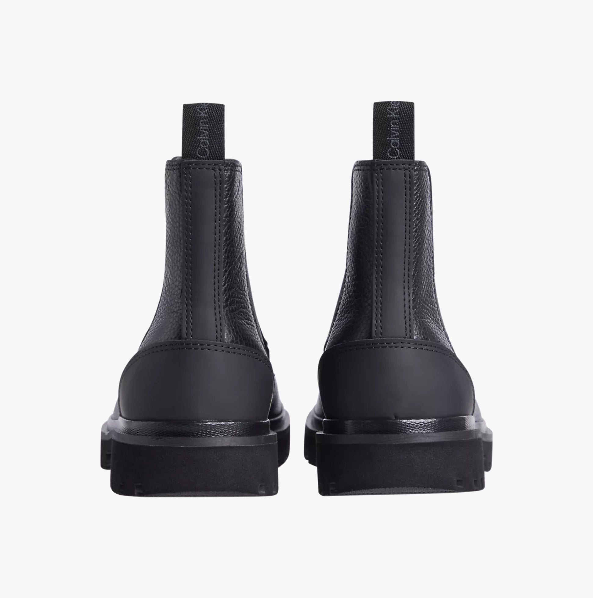 Calvin Klein EVA MID CHELSEA BOOTS Mens Triple Black back view highlighting the leather upper and elasticated side panel.
