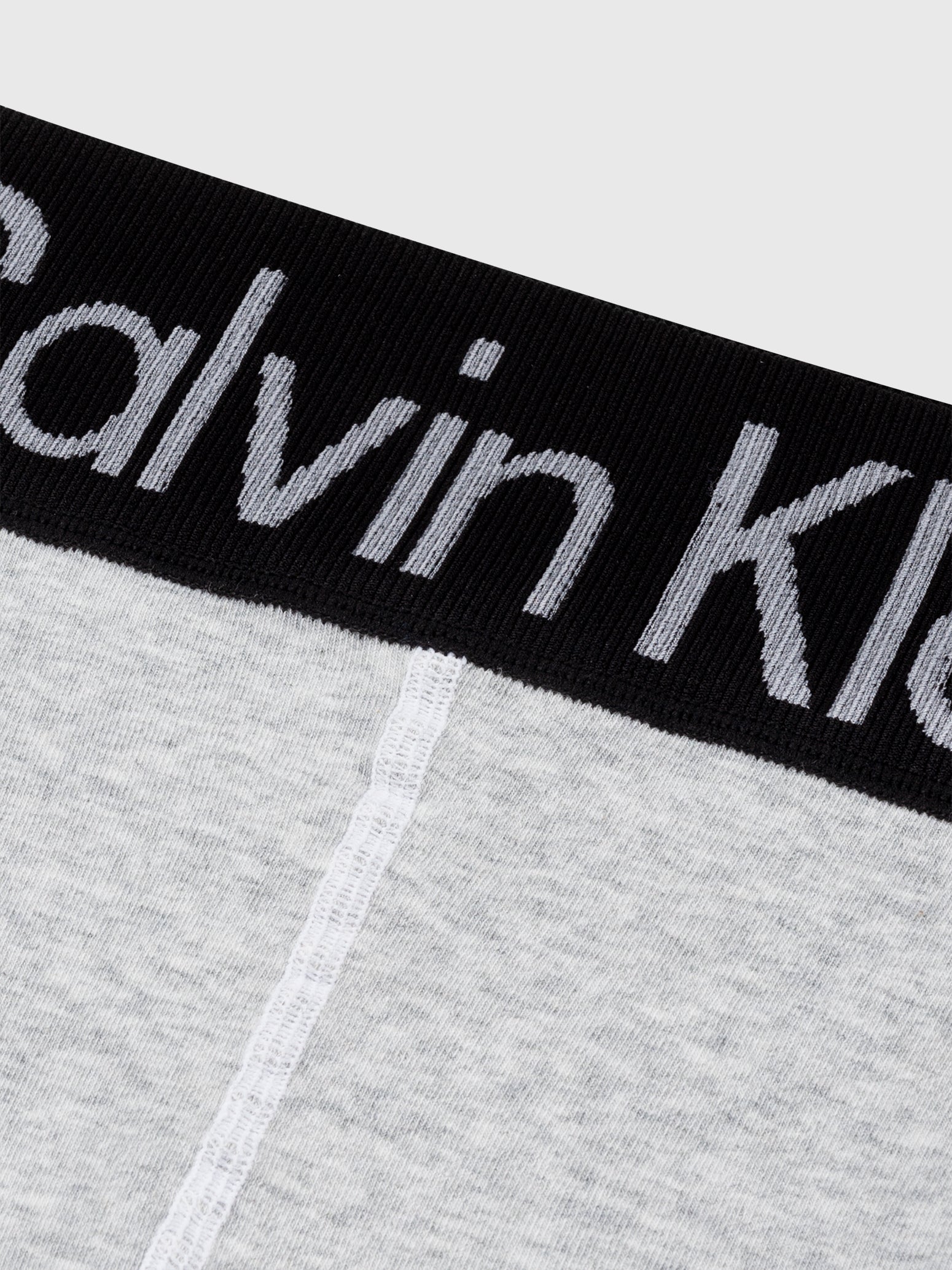 Calvin Klein LOGO Waist Leggings Grey detail view of waistband highlighting CK logo.