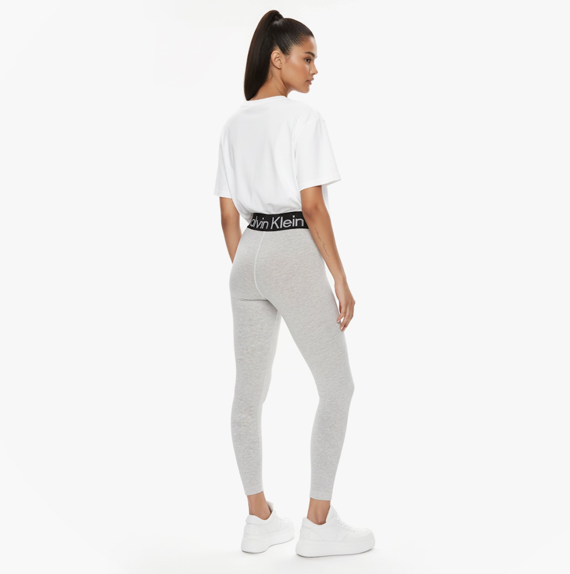 Calvin Klein LOGO Waist Leggings Grey rear view showcasing slim fit and CK logo on waistband.