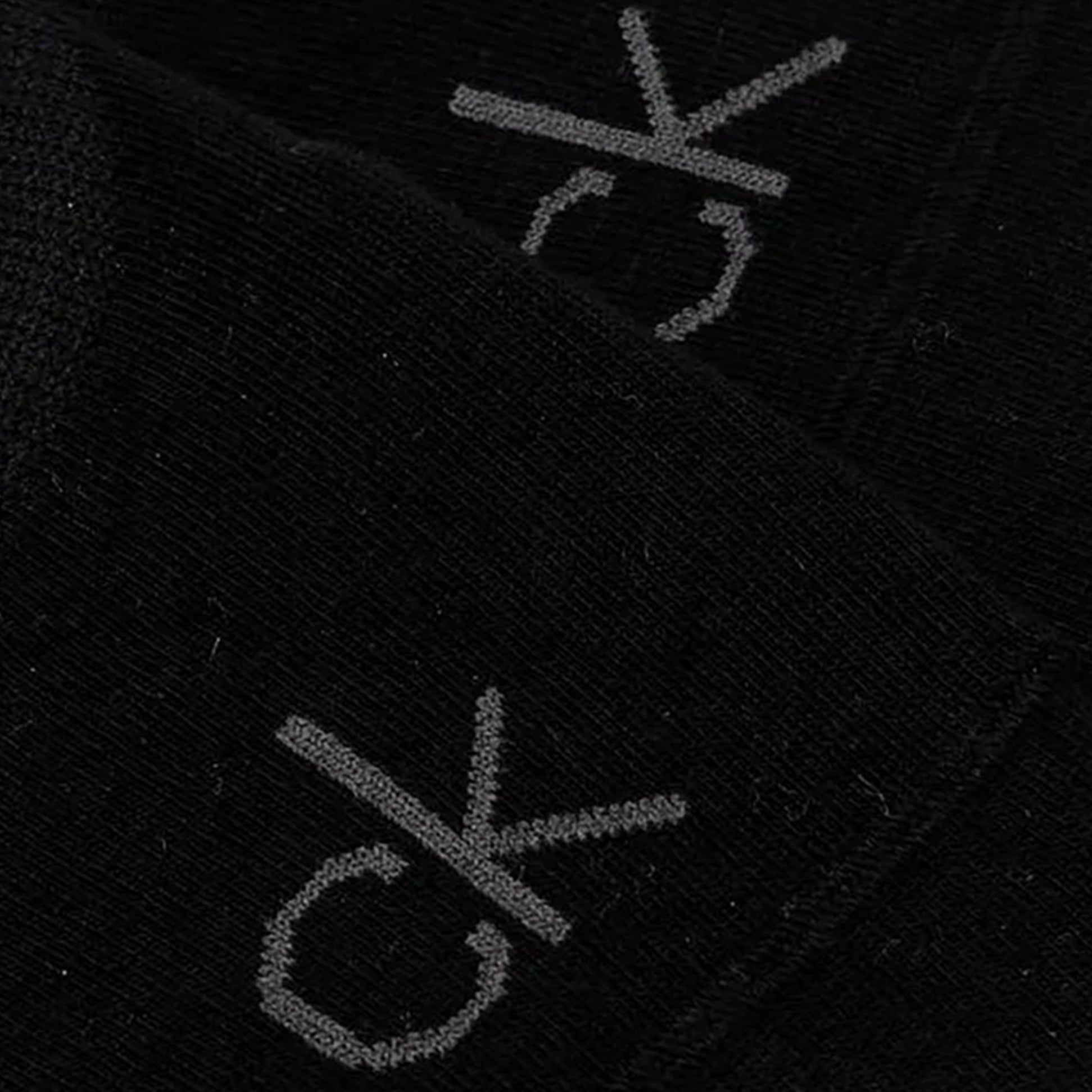 Calvin Klein 2 Pack Womens No-Show Footie Socks Black detail view showing logo on the black fabric.
