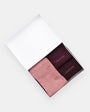 Calvin Klein 3 Pack Giftboxed Logo Womens Crew Socks Burgundy Combo in open gift box, showcasing burgundy and pink socks.