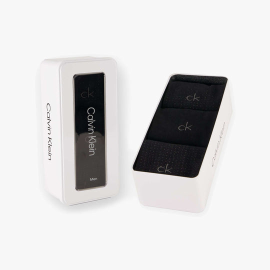 Calvin Klein 3 Pack Giftbox Dropknee Mens Socks Black in white gift box showing side view of packaging and black socks inside.