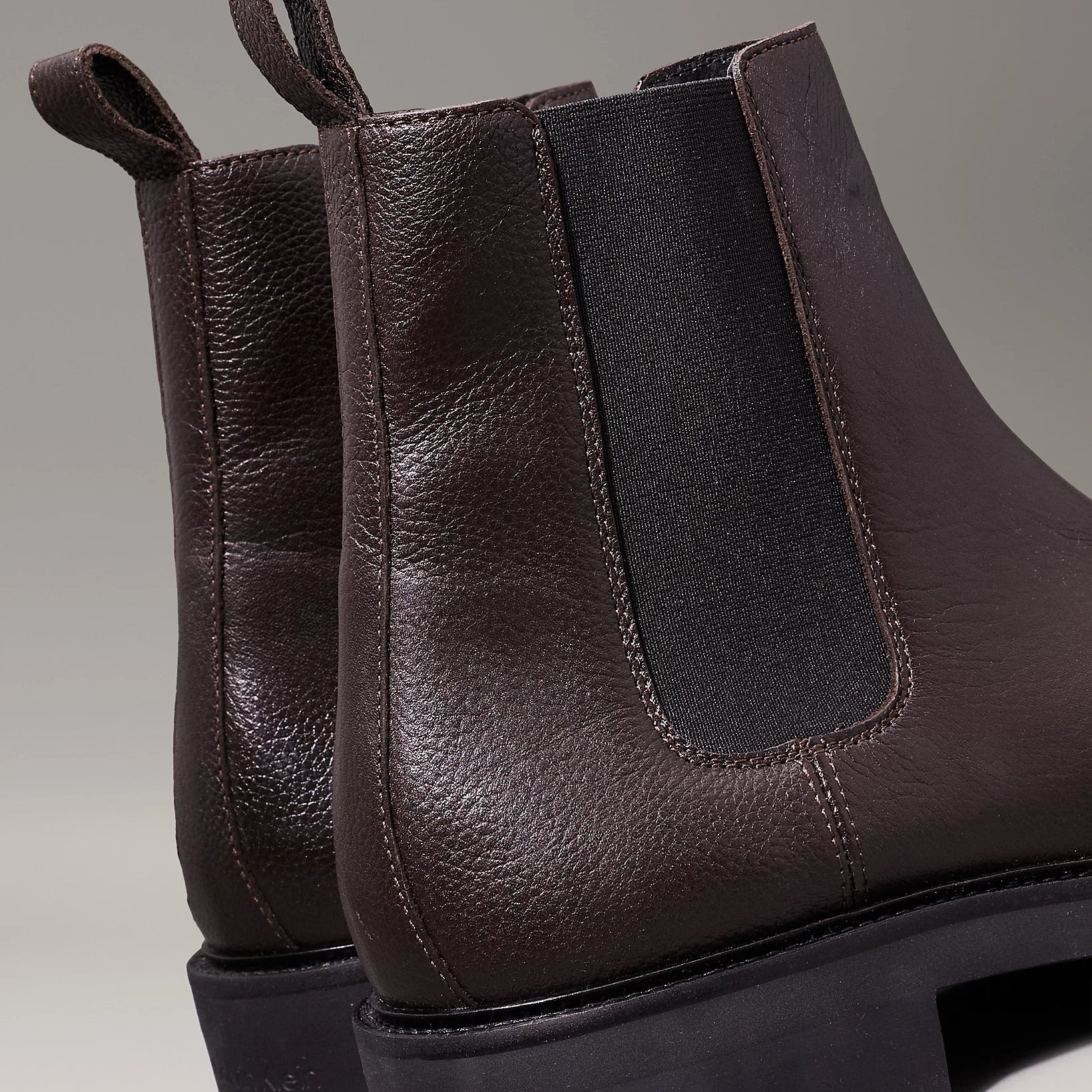 Calvin Klein CHELSEA BOOTS Mens Mole, rear view showing brown leather upper and elasticated side panel.