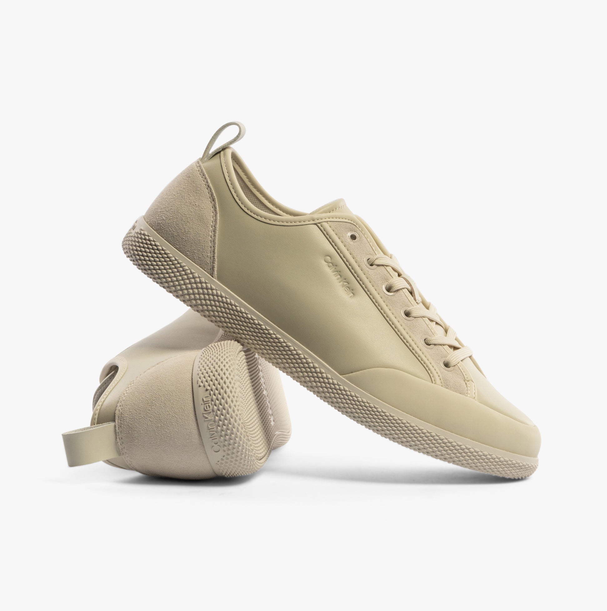 Calvin Klein LOW TOP LACE UP Mens Trainers Dk Ecru side view showing casual leather sneakers with flat rubber sole.
