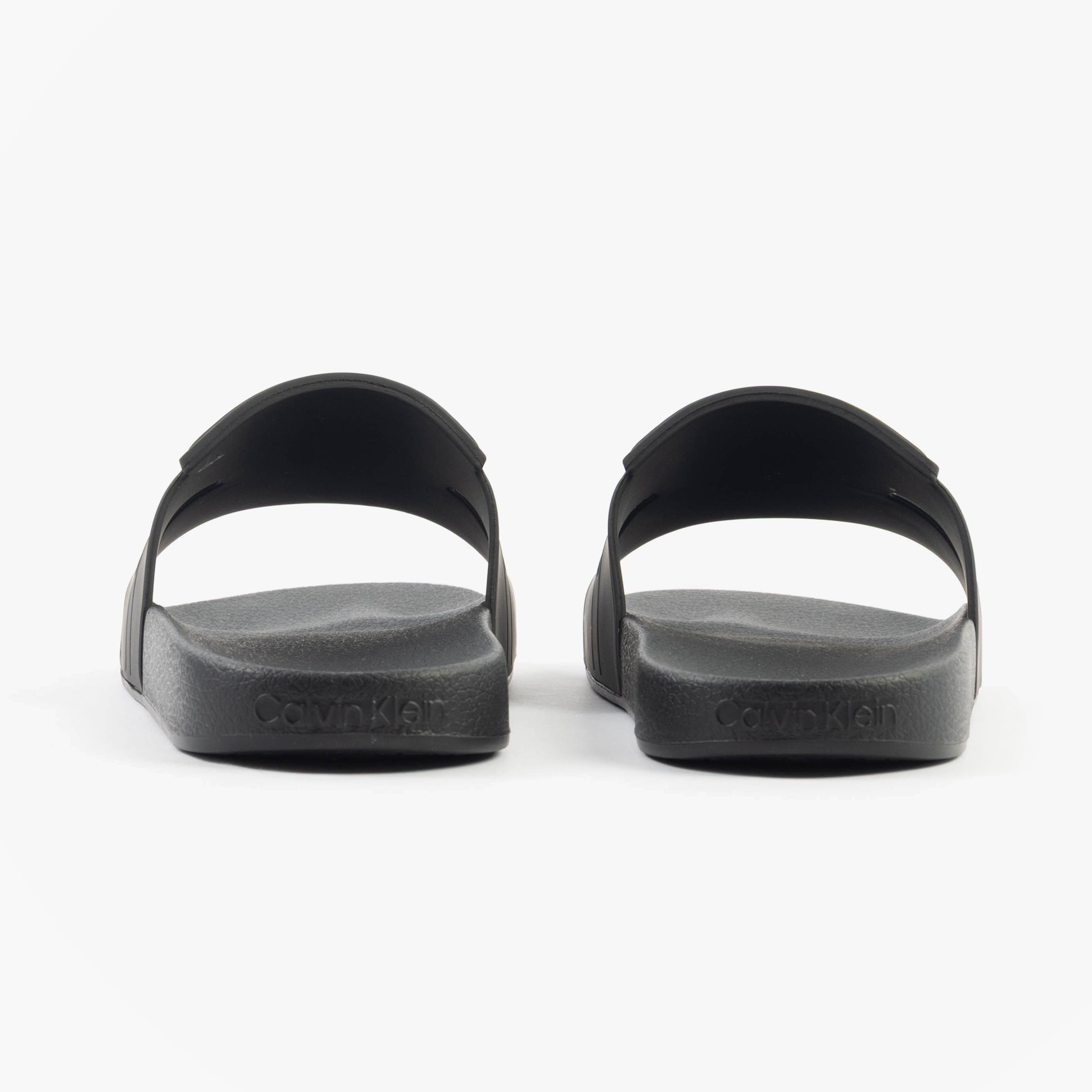 Calvin Klein POOL SLIDE DOUBLE T Mens Sliders Ck Black rear view showcasing the synthetic design and rubber sole.