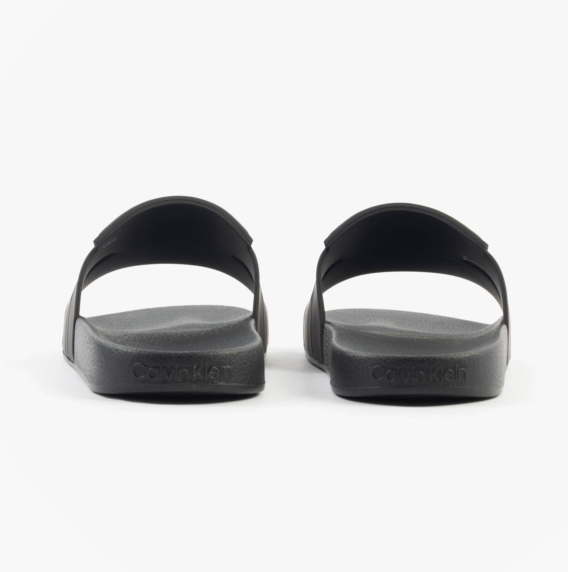 Calvin Klein POOL SLIDE DOUBLE T Mens Sliders Ck Black rear view showcasing the synthetic design and rubber sole.