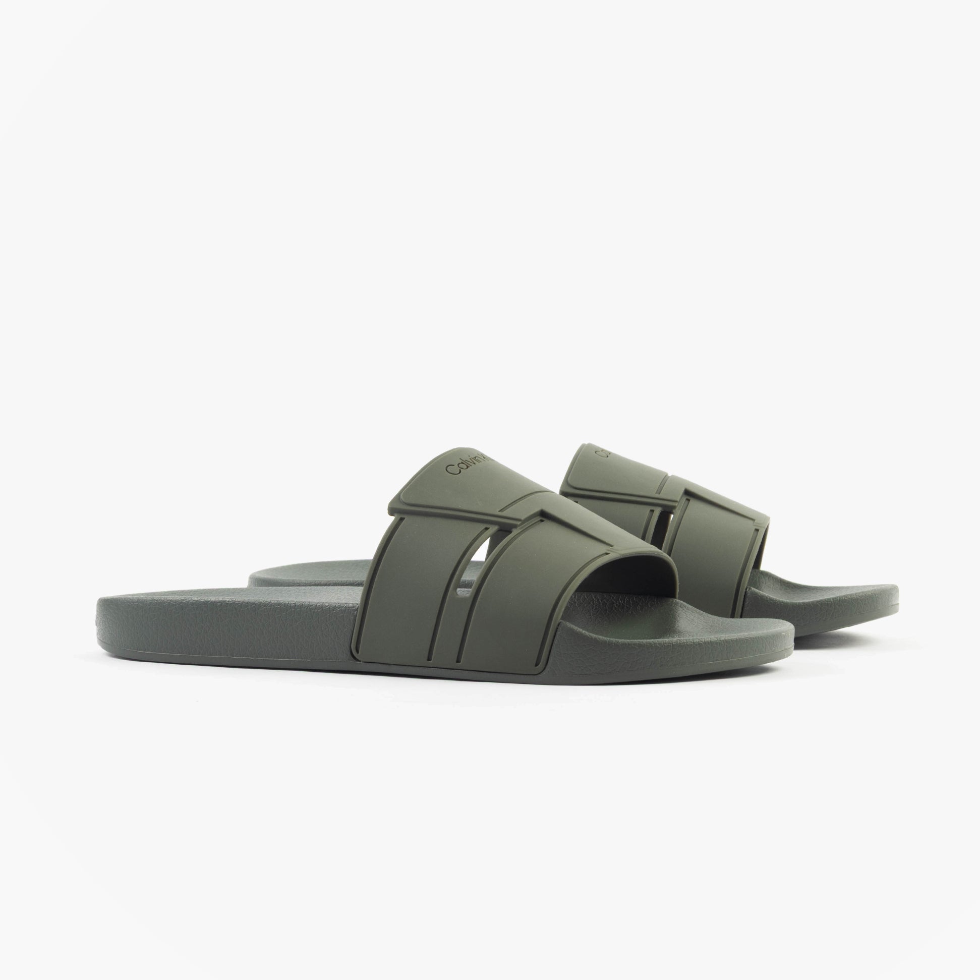 Calvin Klein POOL SLIDE DOUBLE T Mens Sliders Dark Olive side view showing lightweight synthetic upper and flat rubber sole.