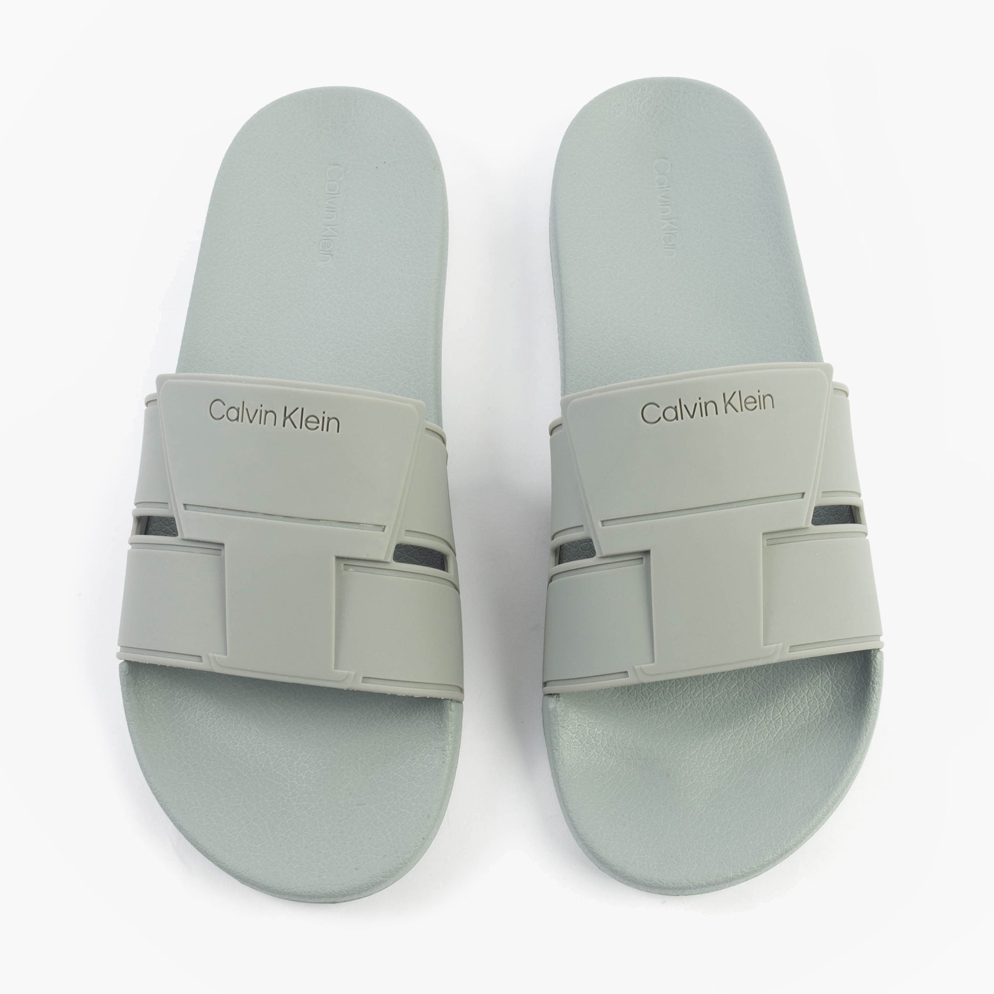 Calvin Klein POOL SLIDE DOUBLE T Mens Sliders Granite Road top view, showcasing slip-on design and synthetic materials.