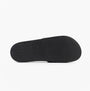 Calvin Klein POOL SLIDE W/ CK SQU Mens Sliders Black bottom view showcasing rubber sole with textured grip.