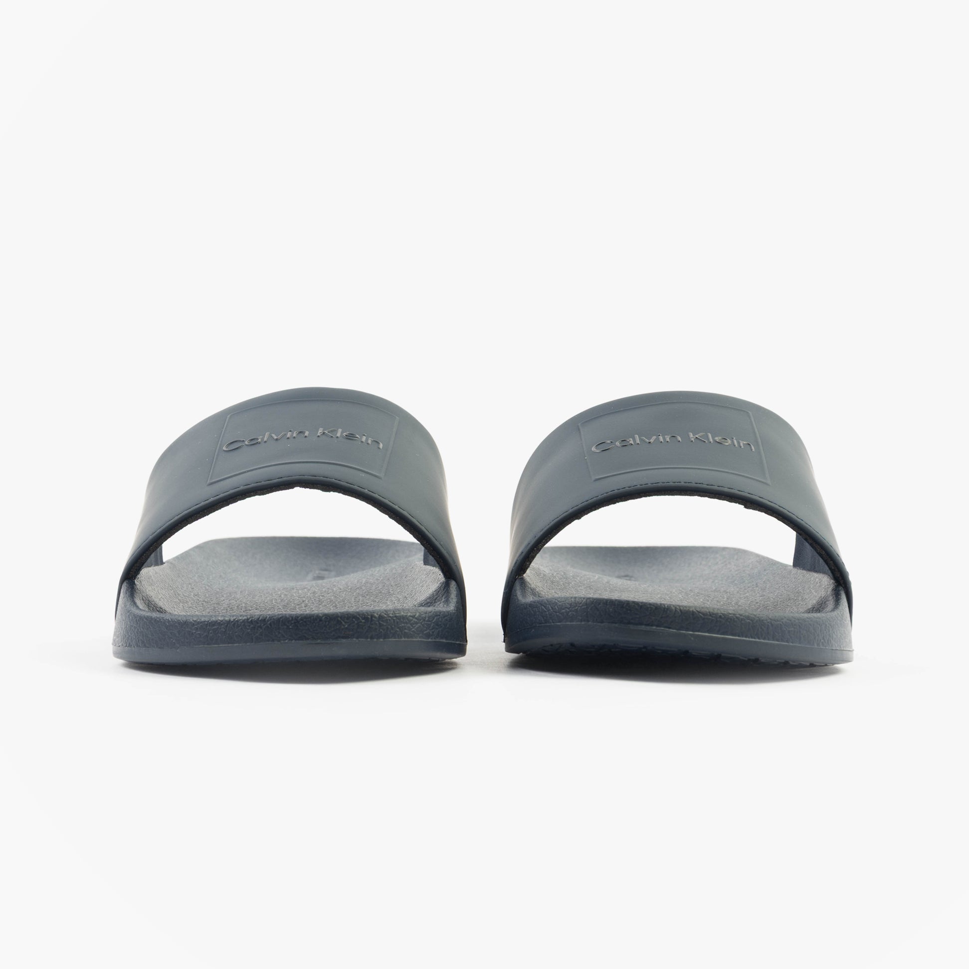 Calvin Klein POOL SLIDE W/ CK SQU Mens Sliders Calvin Navy front view showcasing synthetic upper and rubber sole.