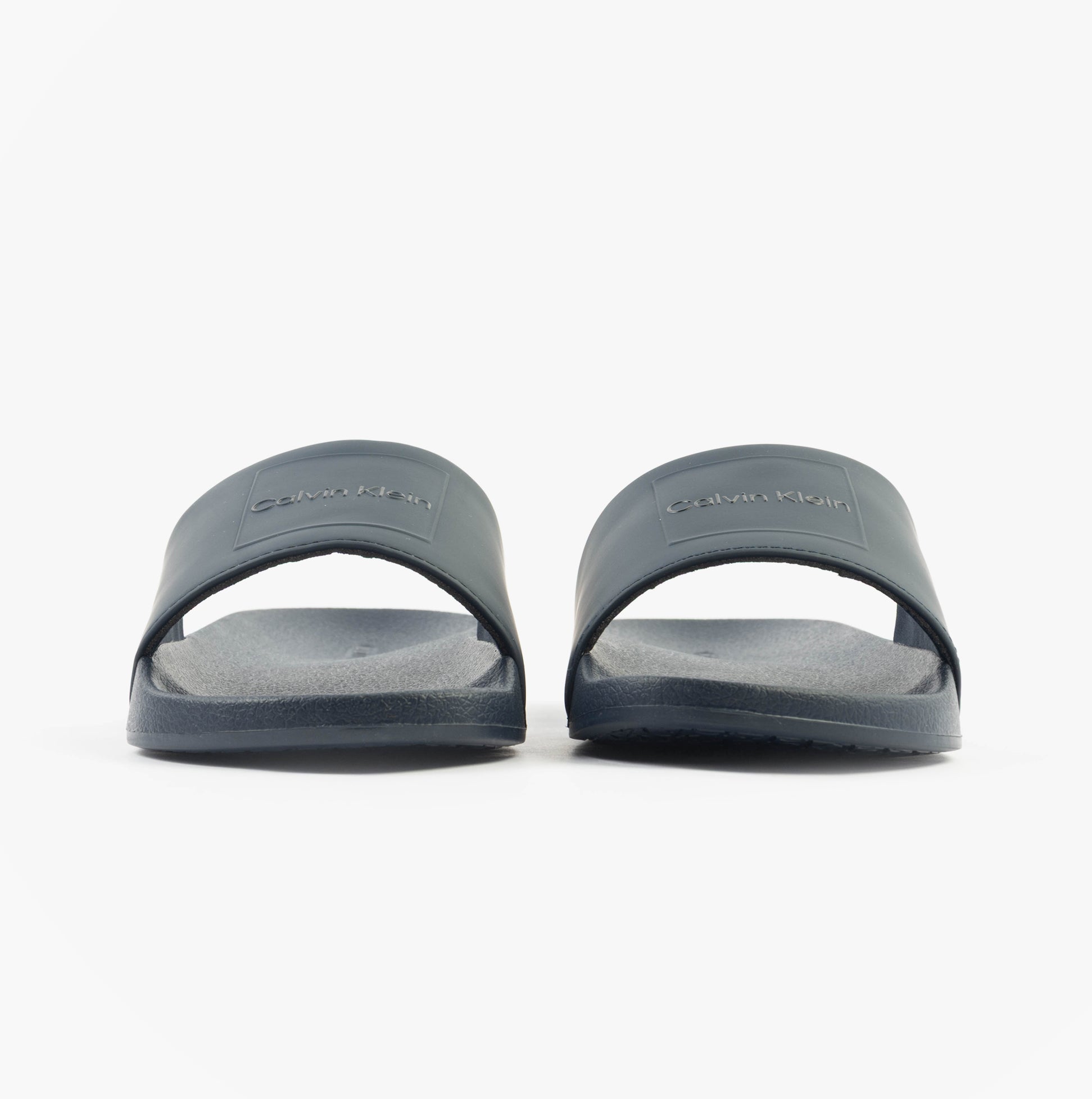 Calvin Klein POOL SLIDE W/ CK SQU Mens Sliders Calvin Navy front view showcasing synthetic upper and rubber sole.