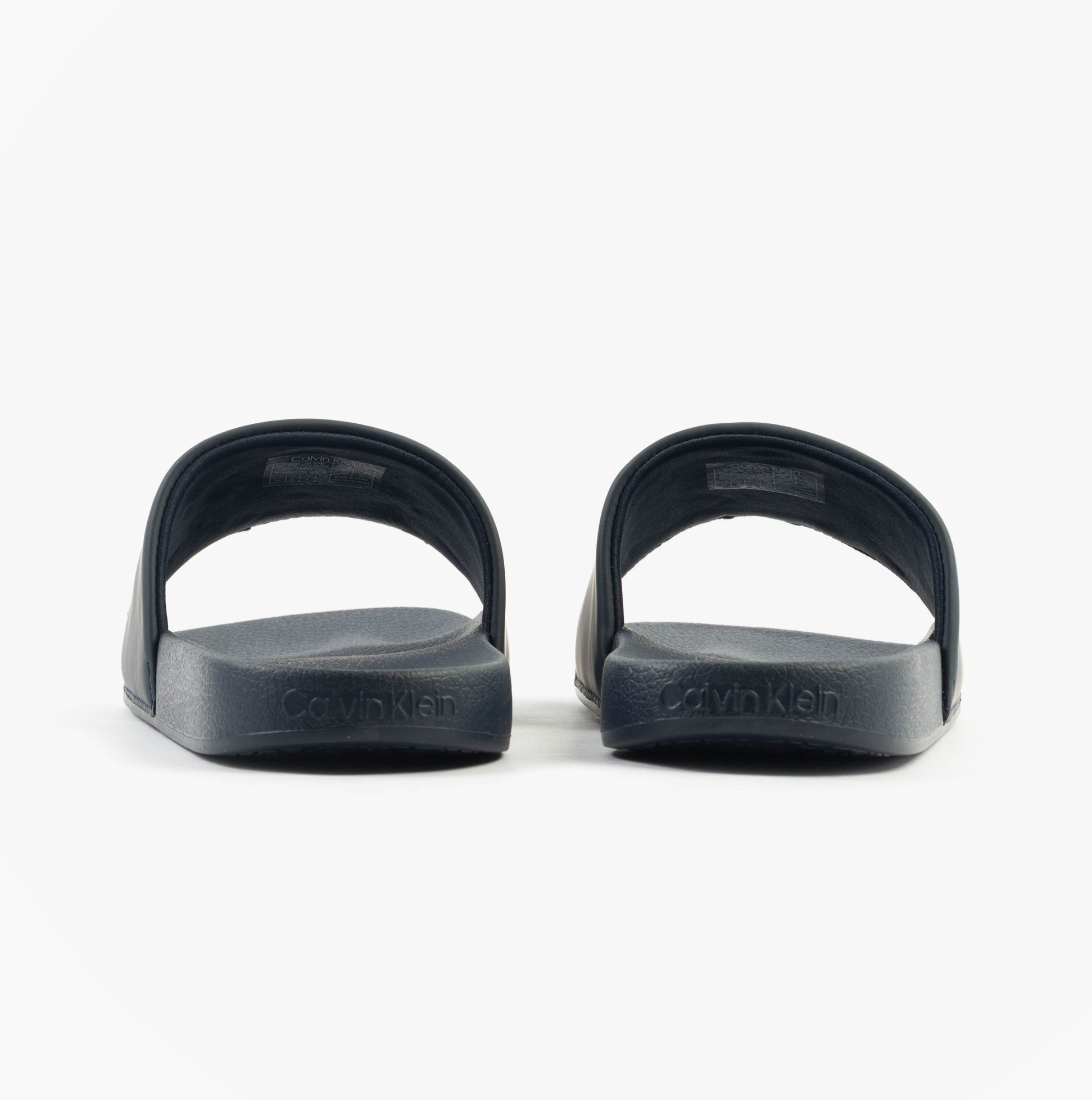 Calvin Klein POOL SLIDE W/ CK SQU Mens Sliders Calvin Navy rear view showing slip-on design and logo.