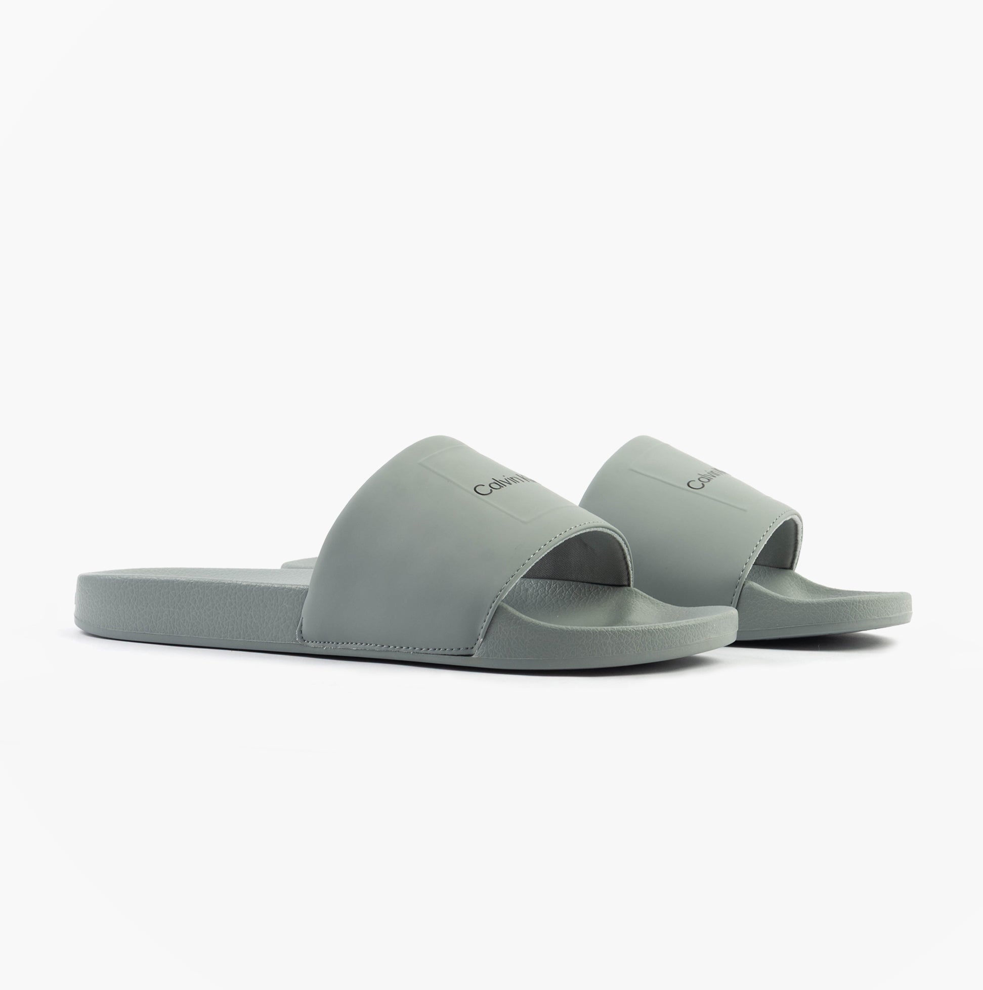 Calvin Klein POOL SLIDE W/ CK SQU Mens Sliders Granite Road side view, synthetic upper, lightweight and comfortable design.