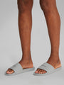 Calvin Klein POOL SLIDE W/ CK SQU Mens Sliders Granite Road side view on model's feet showcasing comfort and lightweight design.