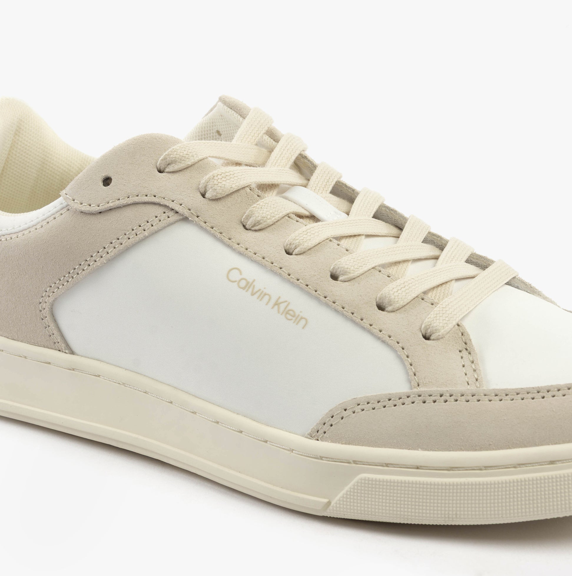Calvin Klein LOW TOP LACE UP Mens Trainers White/Dark Ecru side view showing laces and logo detailing.