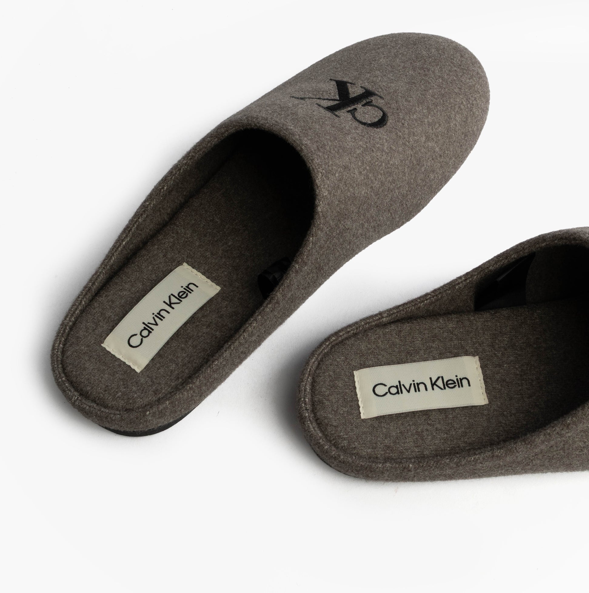 Calvin Klein HOME SLIPPER MULE Mens Slippers Multicoloured top view showing soft brown material and logo.
