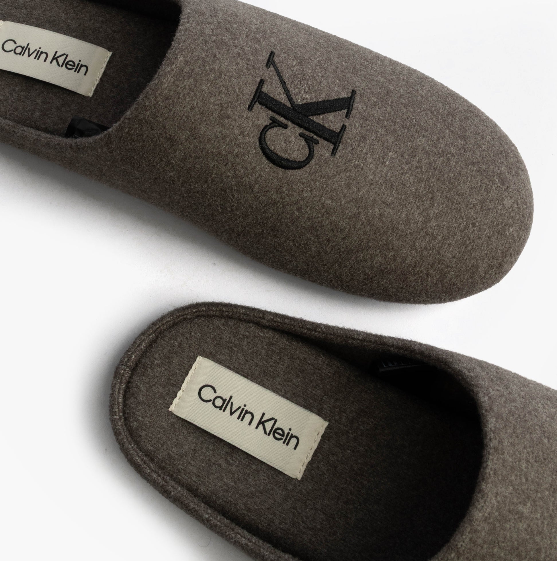 Calvin Klein HOME SLIPPER MULE Mens Slippers Multicoloured side view featuring grey fabric and CK logo detail.